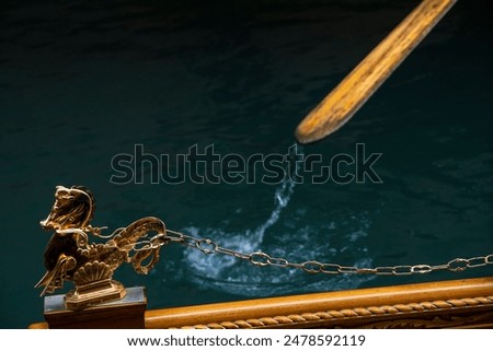 Similar – Image, Stock Photo The gondolas splash in the blue calm water. They are attached to wooden poles.