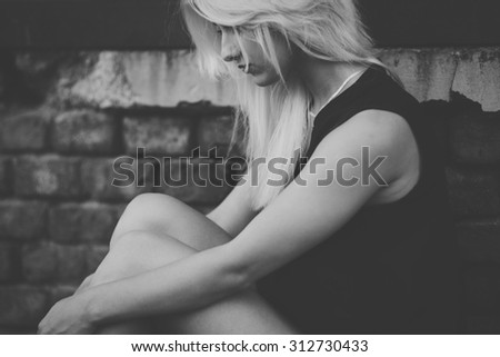 Sad Hipster Woman Outdoors. Black and white