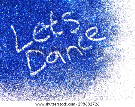 Dark blue glitter sparkle with words Let\'s Dance on white background