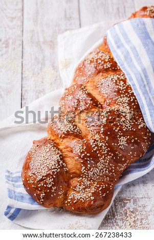 Challah bread with sesame seeds. Pastry,flour and sesame seeds.selective focus