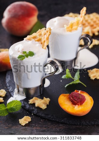 Peach  ice cream with mint, selective focus