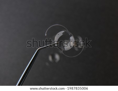 closeup photo of elastic intra ocular lens for cataract surgery Stok fotoğraf © 