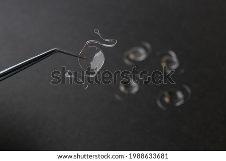 closeup photo of elastic intra ocular lens for cataract surgery Сток-фото © 