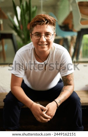 Similar – Image, Stock Photo Transgender man with modern haircut in striped jacket