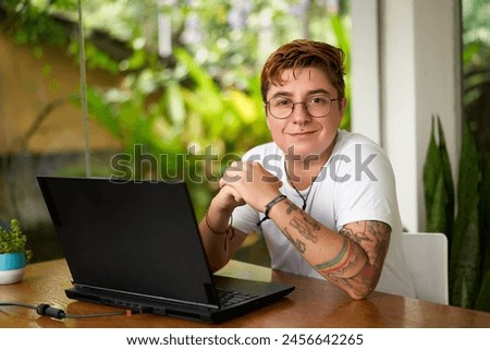 Similar – Image, Stock Photo Transgender man with modern haircut in striped jacket