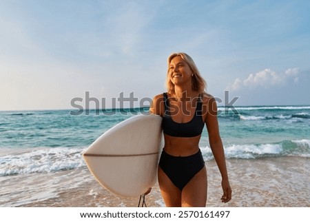 Similar – Image, Stock Photo Serene woman on surfboard in sea