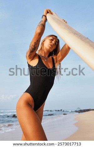 Similar – Image, Stock Photo Coastal landscape and girl in yellow hooded coat looking at sea and walking. Copy space.