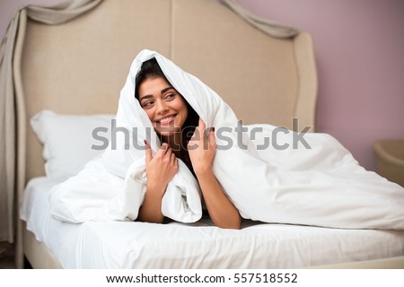 Similar – Image, Stock Photo Positive lady hiding under blanket at home