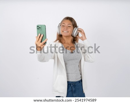 Similar – Image, Stock Photo Teen girl making a selfie