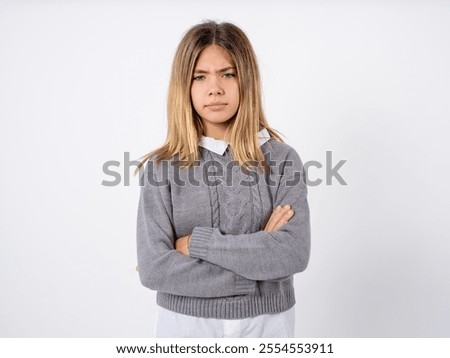 Similar – Image, Stock Photo Beautiful teenage girl opens a gift made of kraft paper tied with a red ribbon, new year mood. Holiday concept of Christmas and New Year at home.