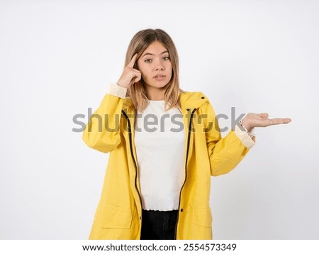 Similar – Image, Stock Photo Beautiful teenage girl opens a gift made of kraft paper tied with a red ribbon, new year mood. Holiday concept of Christmas and New Year at home.