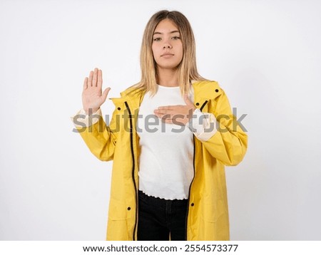 Similar – Image, Stock Photo Beautiful teenage girl opens a gift made of kraft paper tied with a red ribbon, new year mood. Holiday concept of Christmas and New Year at home.