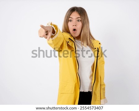 Similar – Image, Stock Photo Beautiful teenage girl opens a gift made of kraft paper tied with a red ribbon, new year mood. Holiday concept of Christmas and New Year at home.