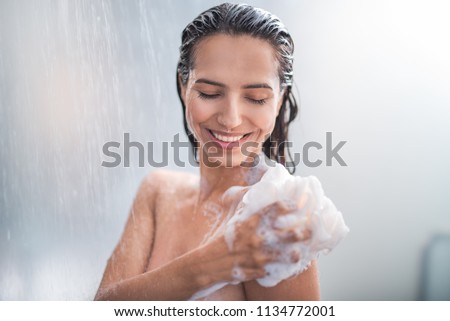 Similar – Image, Stock Photo Young woman taking bubble bath in bathroom