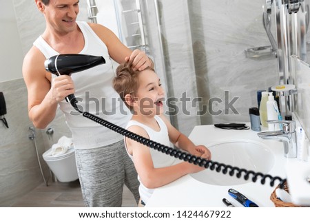 Similar – Image, Stock Photo Father making haircut for son at home