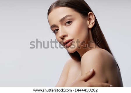 Similar – Image, Stock Photo Crop calm attractive woman standing in nature in evening sun