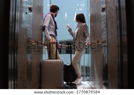 Similar – Image, Stock Photo Two multistory buildings standing face to face.