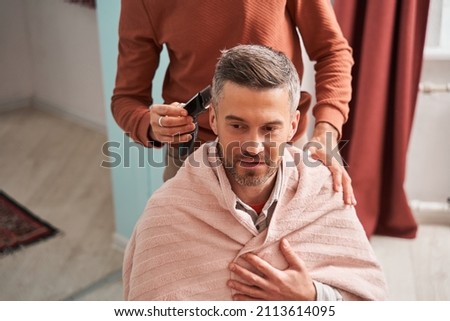 Similar – Image, Stock Photo Father making haircut for son at home