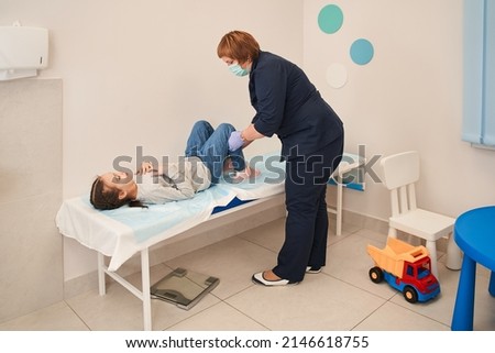 Similar – Image, Stock Photo Little girl laying playing on grass enjoying summer day during vacation trip