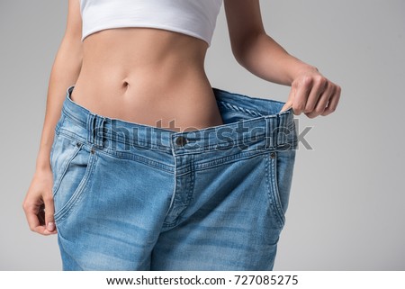 Similar – Image, Stock Photo Slim woman standing in summer park