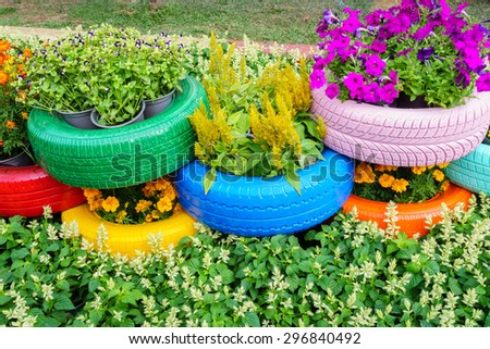 Colorful flowers and tire pots/HoChiMinh, Vietnam â?? February 17th 2015: Colorful flowers and tire pots in Tet 2015 festival , on NguyenHue Street, HoChiMinh, Vietnam