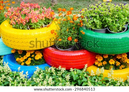 The colorful flowers and tire pots/HoChiMinh, Vietnam â?? February 17th 2015: Colorful flowers and tire pots in Tet 2015 festival , on NguyenHue Street, HoChiMinh, Vietnam