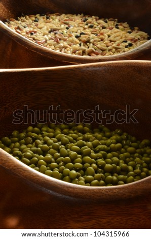 Bowls with health food/Mung Beans Rice and Lentils/2 wooden bowl filled with Mung Beans