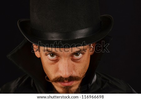 Man with top hat and cape with evil expressions/Evil Villain/Man who is dastardly