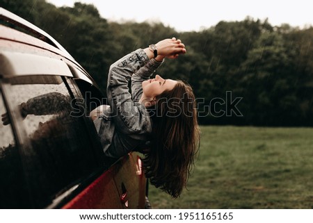 Image, Stock Photo a woman enjoys after a hiking trip the achieved view on sea and rocks in the sun