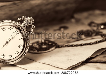 Vintage background with old watch