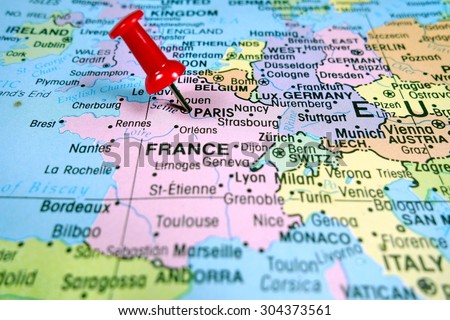 pushpin marking on Paris map