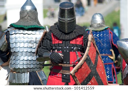 three historical reenactment armed knights. Russia, Novgorod.
