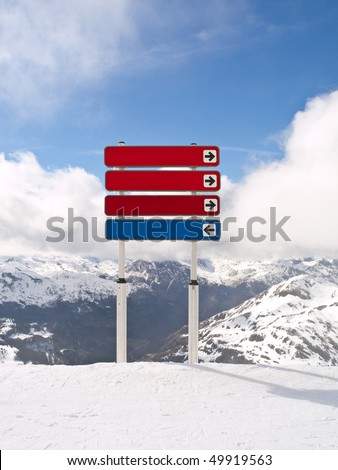Directional signs on a ski slope in Astun Ski Resort, Spain