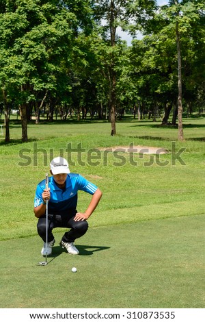 CHIANGRAI,THAILAND-AUG 22 : Thai young golf player Pongsagorn Panyasu in action during practise before enter golf tournament on August 22,2015 at golf coures in Chiang rai,Thailand