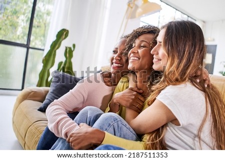 Similar – Image, Stock Photo Cheerful women hugging in mountains