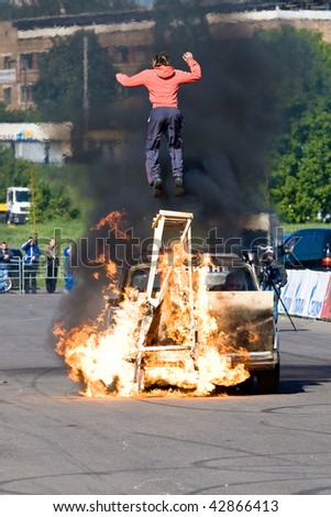 MOSCOW - JUNE 6 : Stunt man Ivan Simakov jumps over fire during a Stunt man show on June 6, 2008 in Moscow