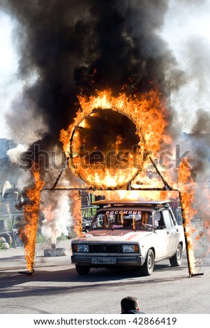 MOSCOW - JUNE 6 : Stunt man Igor Zverev jumps through a ring of fire during a stunt man show June 6, 2008 in Moscow