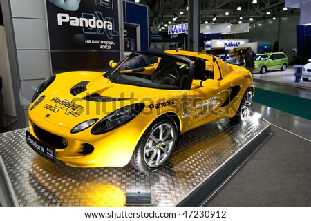 MOSCOW, RUSSIA - AUGUST 28: Yellow sport car Lotus at Moscow International exhibition InterAuto on August 28, 2009 in Moscow, Russia.