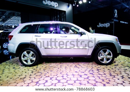 MOSCOW, RUSSIA - AUGUST 25:  Grey car Jeep Cherokee on display at Moscow International exhibition InterAuto on August 25, 2010 in Moscow, Russia.