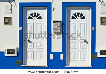 Wooden Doors in the Wall of Portuguese Home