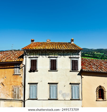 Facades of Old Italian Houses with Crumbling Plaster