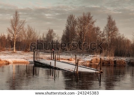 Frosty morning on the lake, the beginning of winter