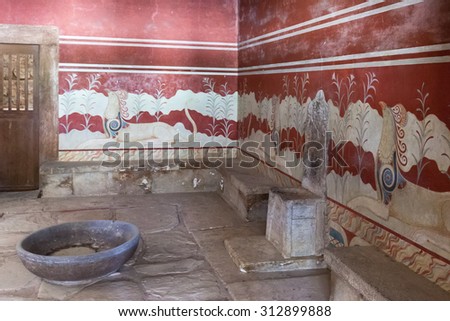 CRETE, GREECE- JULY 26, 2015: Knossos Palace is the largest Bronze Age archaeological site on Crete. One of the halls with King\'s  throne
