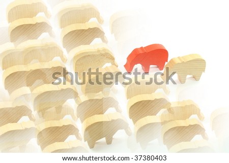 red wooden elephants on a white background