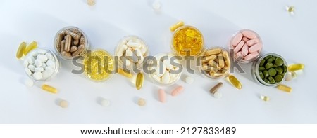 Supplements and vitamins on a white background. Selective focus. Medicine. Stock foto © 