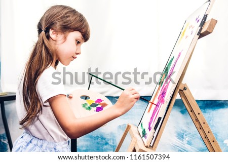 Similar – Image, Stock Photo Kid drawing on canvas at home