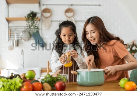 Similar – Image, Stock Photo Preparation of soup in a pot, in nature.