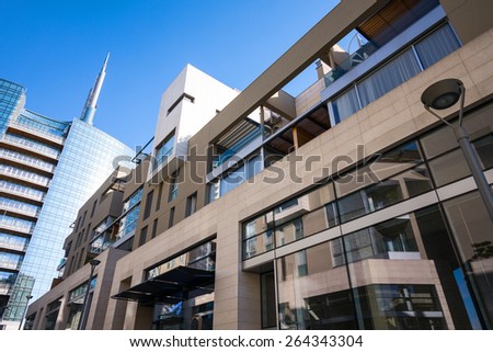 Milan, Italy - January 26 2015: Porta Nuova, the Corso Como residence with the Unicredit Tower in the background