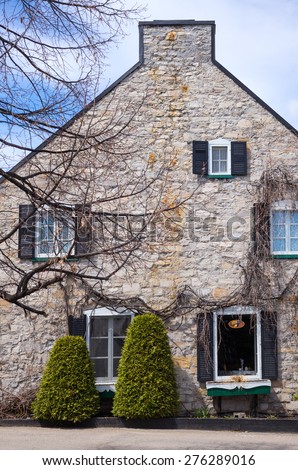 Baie Saint Paul, Canada - May 6 2014: The old Otis house  in St Jean Baptiste street