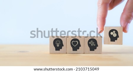 Power skills concept. Need of skills for digital and technology evolution. Soft skill,thinking skill, digital skill. Hand holds wooden cubes with 'power skills' icon on white background, copy space. Foto d'archivio © 